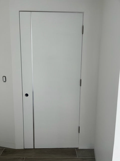 Axel - Interior Solid Core Primed White Door with Solid Aluminum Inlay Shiny Chrome