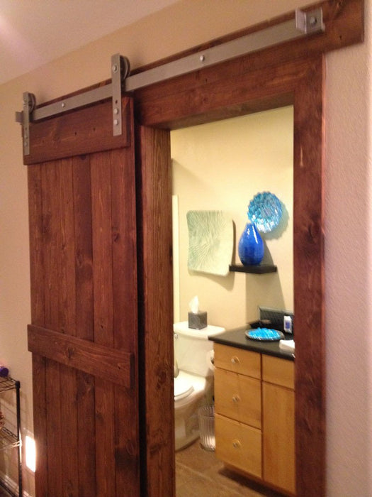 Camilia - Rustic Unfinished 2-Panel V-Groove Knotty Alder Barn Door