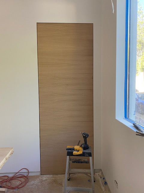 Invisio - Modern Rift Cut White Oak Hidden Door Including Heavy Duty 3D Concealed Hinges and Hidden Aluminum Frame