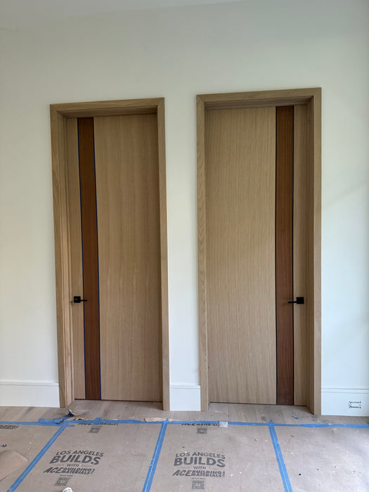 Malaga - Interior Vertical Grain Rift Cut White Oak with Walnut Strip and 1/4" Black Aluminum Strip